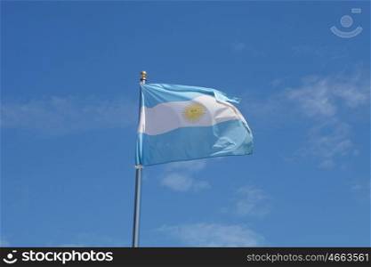 Argentina flag waving in the mast with blue sky background
