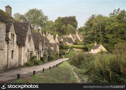 Arlington Row in Cotswolds countryside landscape in England