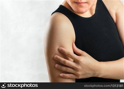 arm and shoulder pain/injury women with white backgrounds, healthcare and medical concept
