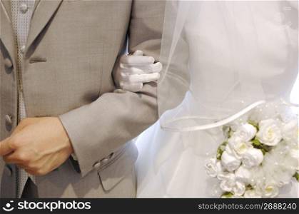 Arm of bridal couple