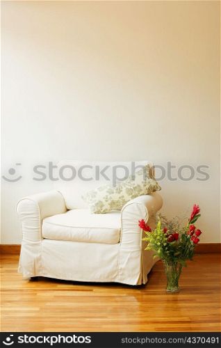 Armchair with a flower vase