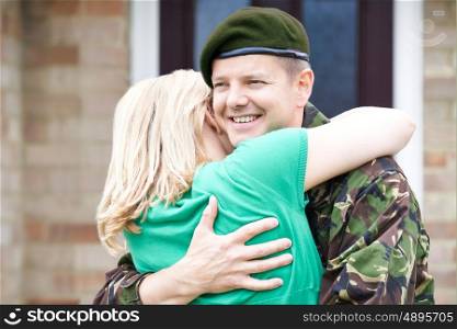 Army Husband Home On Leave Hugging Wife