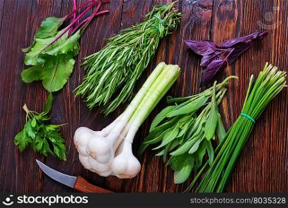 aroma herb and garlic on the wooden table