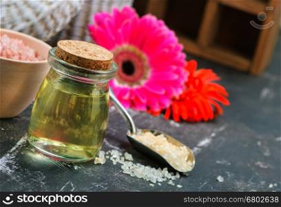 aroma oil in glass bottle and on a table