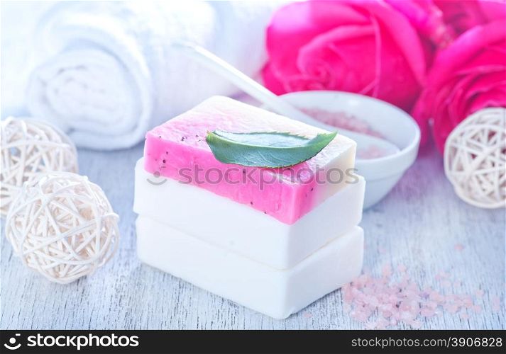 aroma soap and rose on a table