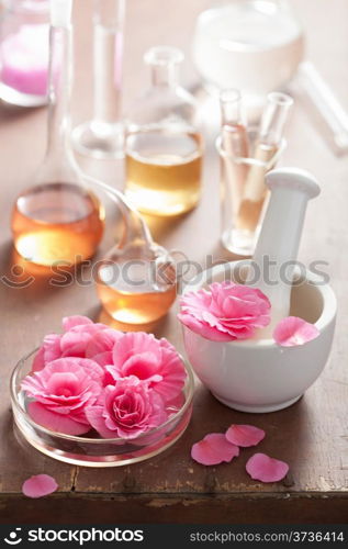 aromatherapy and alchemy with pink flowers