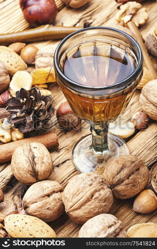 Aromatic alcohol from nuts.Nut liquor.Tincture on nuts.Italian liquor. Autumn nutty liquor