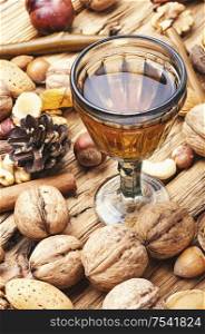 Aromatic alcohol from nuts.Nut liquor.Tincture on nuts.Italian liquor. Autumn nutty liquor