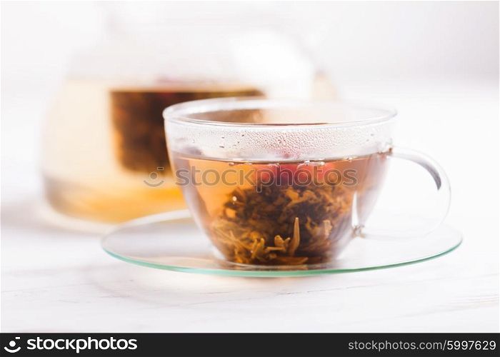 Aromatic Blooming Flower Tea in glass cup. Blooming Flower Tea
