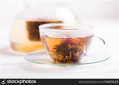 Aromatic Blooming Flower Tea in glass cup. Blooming Flower Tea