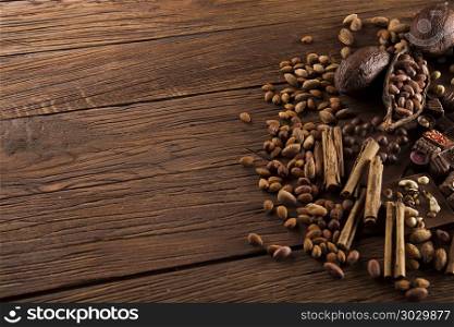 Aromatic cocoa, powder and Dark chocolate background . Chocolate sweet, cocoa pod and food dessert background