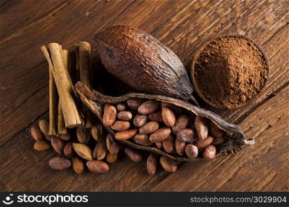 Aromatic cocoa, powder and Dark chocolate background . Chocolate sweet, cocoa pod and food dessert background