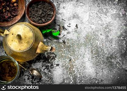 Aromatic Indian tea. On a rustic background.. Aromatic Indian tea.