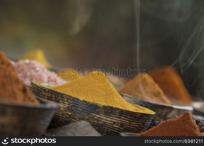 Aromatic spices, smoke and Still Life background