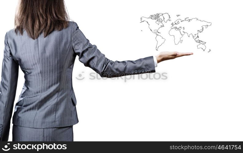 Around the world. Back view of businesswoman holding globe in palm