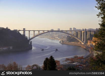 Arrabida bridge and river traffic, Douro river, Porto, Portugal&#xA;