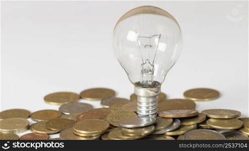 arrangement coins light bulb