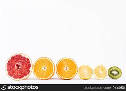 arrangement half fresh tropical fruits. High resolution photo. arrangement half fresh tropical fruits. High quality photo