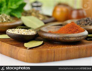 arrangement of spices on a wooden board , close up shot