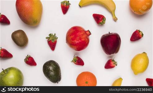 arrangement tropical fruits white surface