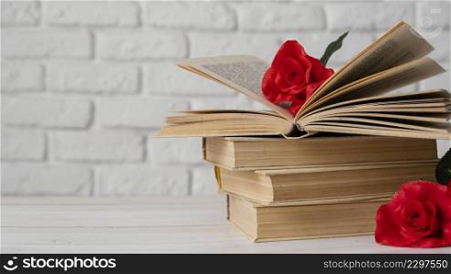 arrangement with books flowers