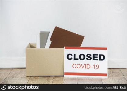 arrangement with box covid19 sign