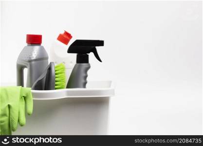 arrangement with cleaning products gloves basin