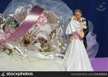 Arrangement with flowers and favors for wedding, baptismand First Communion