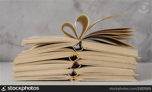 arrangement with open books