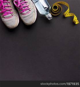 arrangement with running shoes water bottle. High resolution photo. arrangement with running shoes water bottle. High quality photo