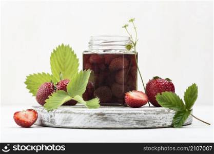arrangement with strawberries jar