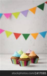 arrangement with tasty muffins party