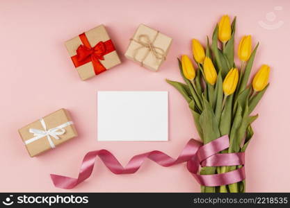 arrangement yellow tulips with empty card