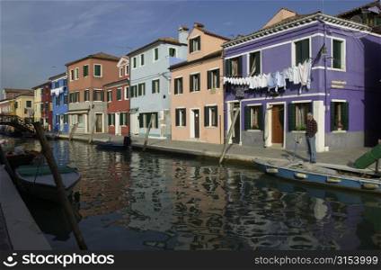 Array of residential buildings on the banks of a canal in Venice, Italy