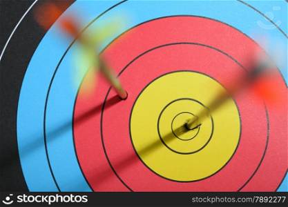 arrow hit target, one hit bull&rsquo;s eye - one missed