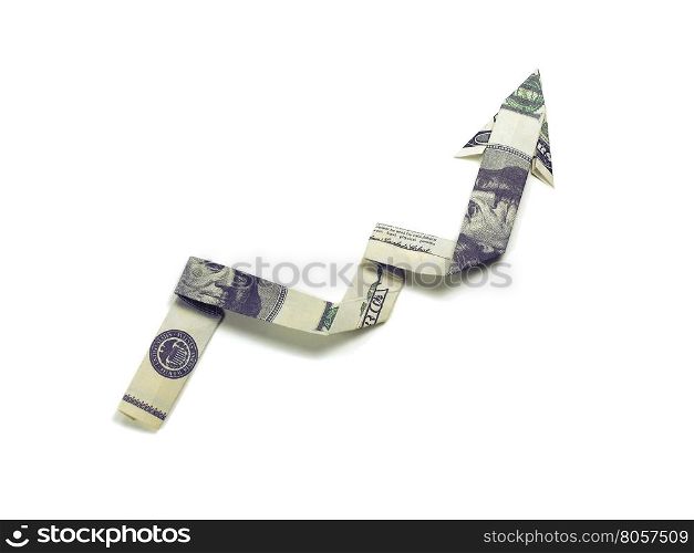 Arrow origami made of dollar bills on a white background. dollars arrow origami