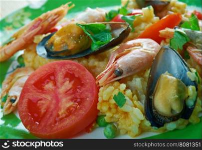 Arroz a la tumbada traditional Mexican dish prepared with white rice and seafood.
