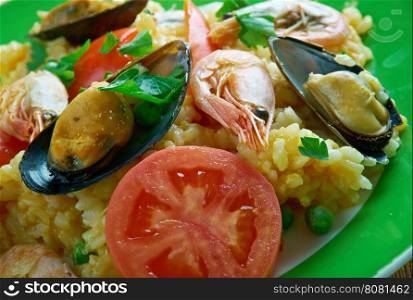 Arroz a la tumbada traditional Mexican dish prepared with white rice and seafood.