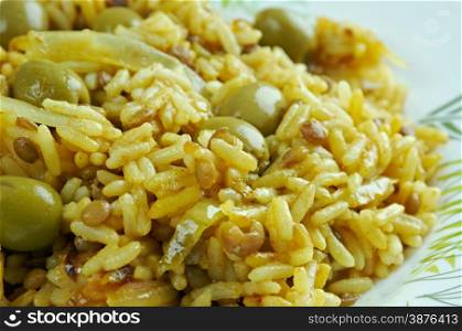Arroz con gandules - rice, pigeon peas . cooked pot with Puerto Rican-style. popular throughout Latin America and the Caribbean.