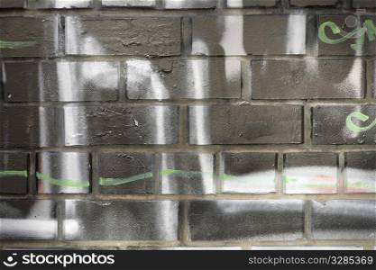 art background - brick wall with graffiti