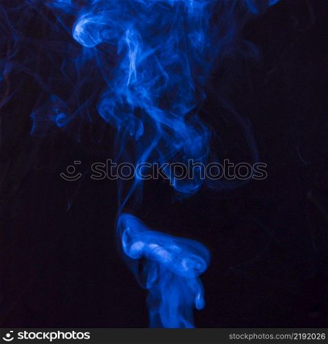 art bright blue smoke moving upward black background