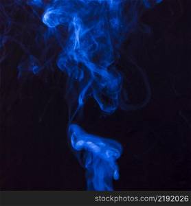 art bright blue smoke moving upward black background
