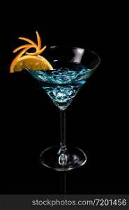Art in orange- fruits carving. How to make to citrus garnish design for a drink. Martini Blue Curacao