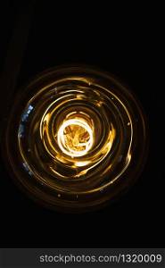 art of lighting of incandescent bulb. Close up. Vertical view