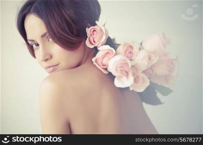 Art photo of charming young lady with roses