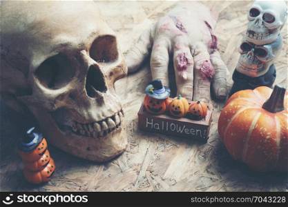 Art picture for Halloween Day, It consists of a human skull and pumpkin, for use about background or wallpaper