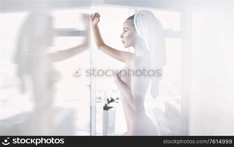 Art portrait of a nude, beautiful woman in a spa