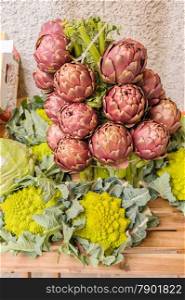 Artichokes and cabbages for sale at the local market