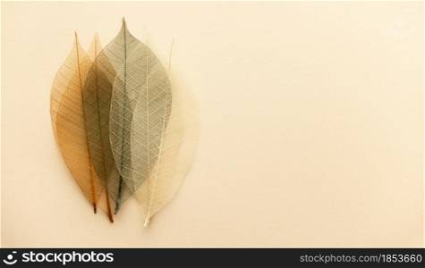 Artificial autumn leaves, closeup, flat lay, horizontal composition copyspace. Artificial autumn leaves, closeup, flat lay, horizontal composition
