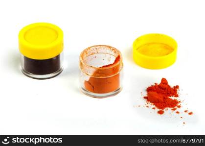 Artificial food coloring pigment or substances in pack.White isolated.